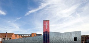 THe building is made of wood with a zinc wrap